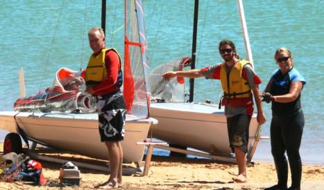 Mike and Jenny Forbes - winners of Dinghy Challenge - with new recruit Cam